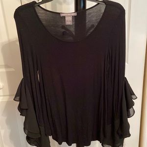Beautiful flowing long sleeve scoop neckline top!